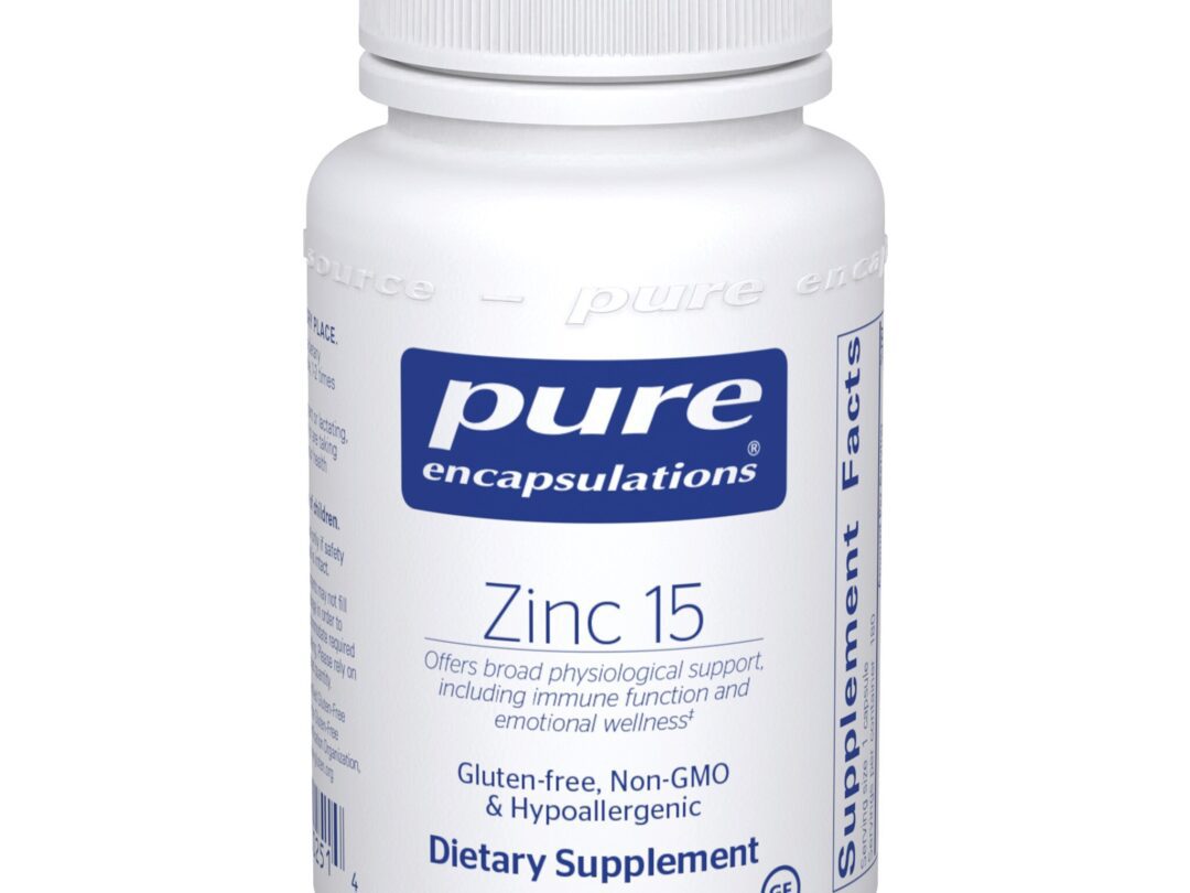 White supplement bottle labeled Zinc 15