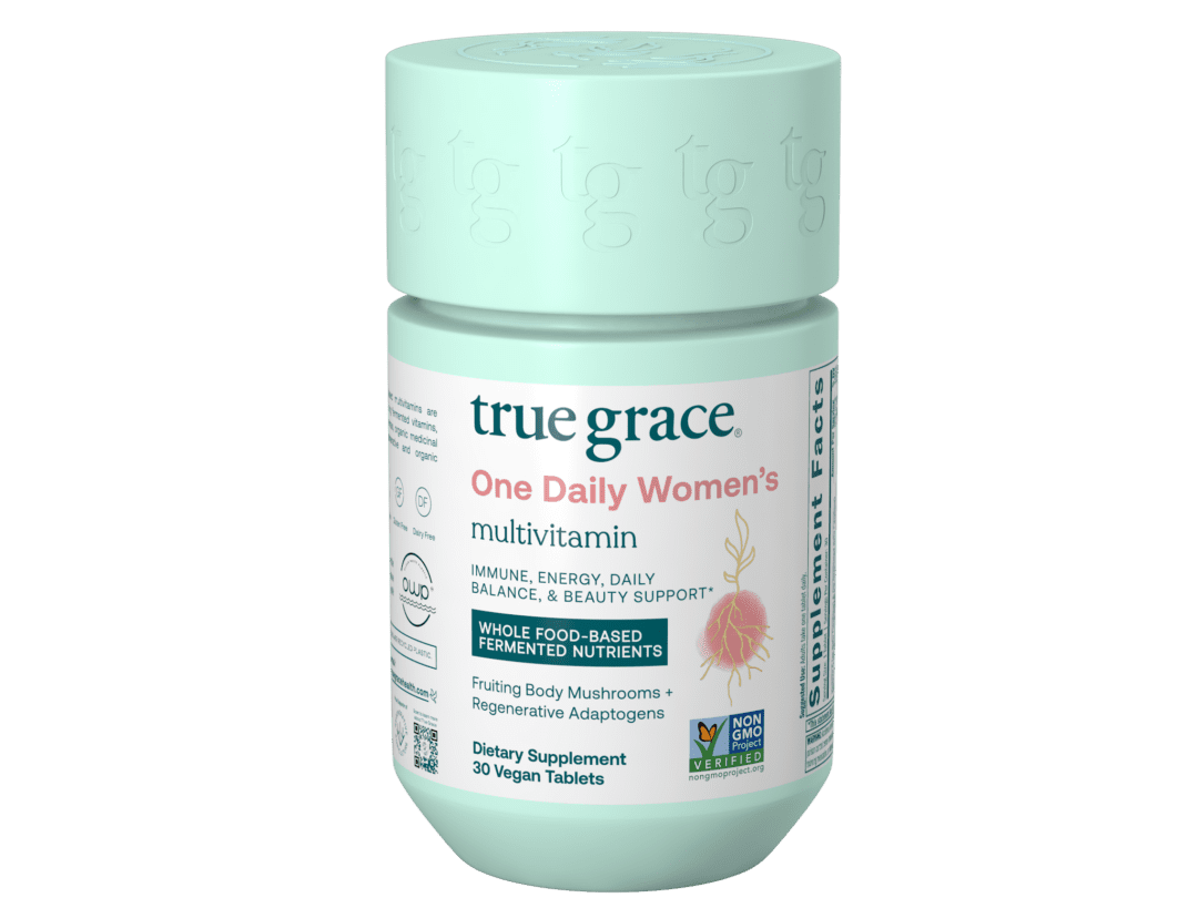 Mint-green bottle of women's multivitamin